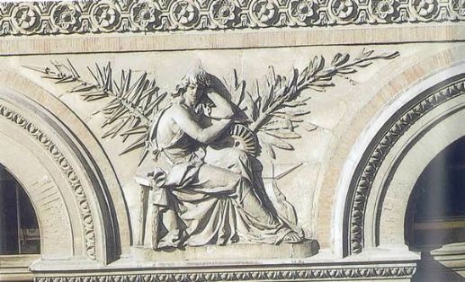 Fachada del Palacio de Fomento. Relieve representando a la Industria con adorno de hoja de palma. Foto extraída del libro El Palacio de Fomento.