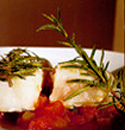 Merluza congelada al romero en compota de tomateFoto de Merluza congelada al romero en compota de tomatees